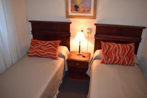 Ένα ή περισσότερα κρεβάτια σε δωμάτιο στο Hotel Esmeralda Select