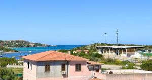 a small building with a view of the ocean at Dimora Mary - Vicino al mare in La Maddalena