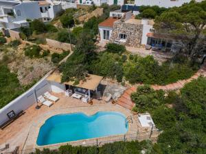 an aerial view of a villa with a swimming pool at Refugio in Carvoeiro