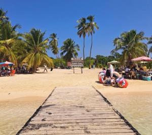 a person riding on a ride on a beach at Casa Vacacional Playa del Sur in Chichiriviche