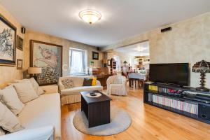a living room with a couch and a tv at Budva Old Town 3 bedroom Condo in Budva