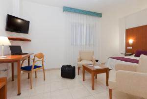 TV a/nebo společenská místnost v ubytování Hotel Verol