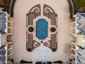 an overhead view of a resort building with a blue door at Manoir de Lébioles in Spa