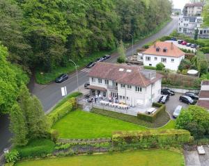 an aerial view of a house with a yard at Chalet Du Mont in Ruien
