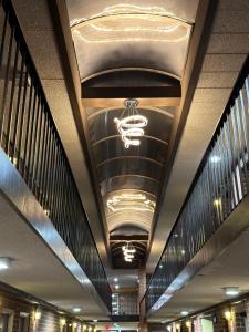 a ceiling in a building with a chandelier on it at Plaza Hotel By OYO Calumet Park Alsip I 57 in Calumet Park