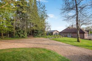 an empty driveway in front of a house at 2 Bed in Stoke oc-c41361 in Hurstbourne Tarrant