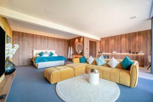 a bedroom with two couches and a bed at 1 Bed in Oban oc-t41733 in Acharra