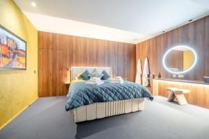 a bedroom with a large bed with wooden walls at 1 Bed in Oban oc-t41733 in Acharra