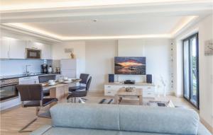 a living room with a couch and a table at Prince in Binz
