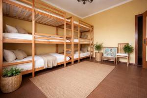 a bedroom with two bunk beds in a room at Shared rooms BOC in Brunate
