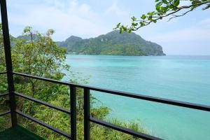 a view of the ocean from a balcony at Phi Phi Oceanview Hill Bungalows in Phi Phi Islands