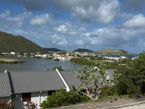 a view of a body of water with a town at Cosy home in Saint Martin