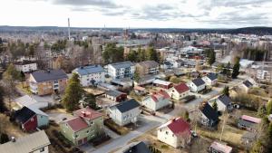 an aerial view of a small town with buildings at Saunatupa Kajaani in Kajaani