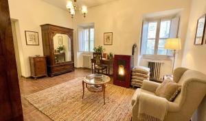 a living room with a couch and a table at Casa di Nonna in Montefranco