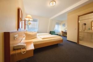Postel nebo postele na pokoji v ubytování Montana Hotel