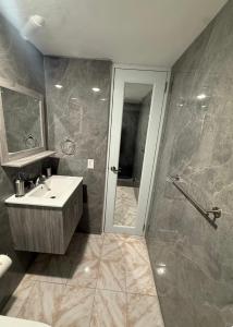 a bathroom with a sink and a shower at Casa Campo Vieques PR in Vieques