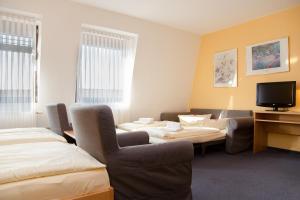 TV a/nebo společenská místnost v ubytování Montana Hotel