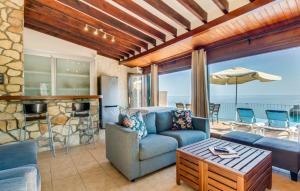 a living room with a couch and a table at Amaret in Deia +24 photos