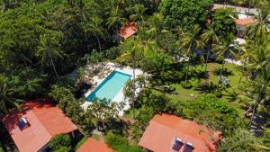 an aerial view of a resort with a swimming pool at Tides Oceanfront Resort in Santa Cruz