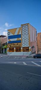 a building on the side of a street at روز بيلا 1 Rosa Bella in Al Jināh