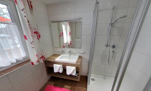 Kúpeľňa v ubytovaní Pension Jaqueline