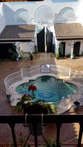 Bazén v ubytování Palacio Doñana , Rural & Luxury nebo v jeho okolí