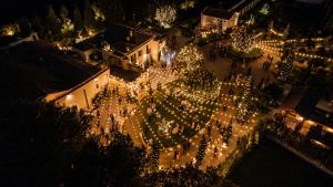 an overhead view of a christmas tree with lights at Masseria Pietrafitta in Foggia