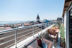a balcony with a view of the ocean at Oban Suites Istanbul in Istanbul