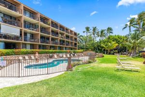 a resort with a swimming pool and a resort at Maalaea Banyans Oceanfront in Wailuku