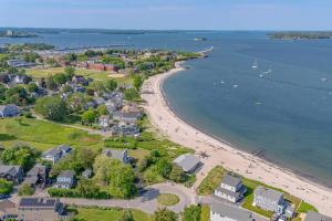 an aerial view of a beach with houses and the water at Walk to Willard Beach in South Portland