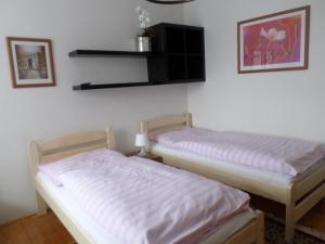 Postel nebo postele na pokoji v ubytování Penzion Harvanek
