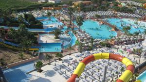 an aerial view of a water park with a roller coaster at Villa Ramolina - Metaponto in Metaponto