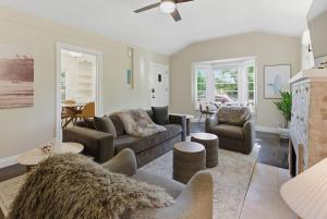 a living room with a couch and a fireplace at Coastal Charm in Santa Cruz