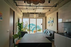 a dining room with a table and chairs at Pacific Surfside Ocean Views in Surf City in ChiltiupÃ¡n +38 photos