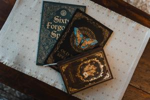 a book with a picture of a butterfly on the cover at Wizard's apartment Plovdiv in Plovdiv