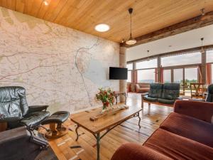 a living room with a large map on the wall at 3 Bed in Kinross oc-55935 in Kinross