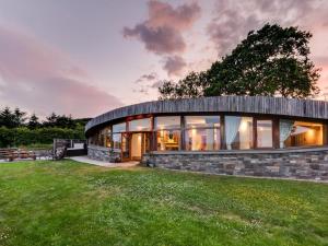 a modern house with a stone facade at 3 Bed in Kinross oc-55935 in Kinross