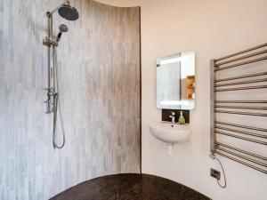 a bathroom with a sink and a mirror at 3 Bed in Kinross oc-55935 in Kinross +30 photos