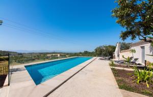 a swimming pool in the backyard of a house at Mater Randa in Algaida