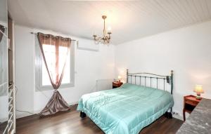 a bedroom with a bed and a window at Authentique Maison Piscine in Saint-Amans-Valtoret +21 photos