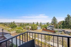 an apartment balcony with a view of a street at Steps to Dome Breathtaking views parking AC! in Tacoma