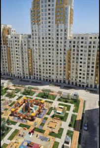 a view of a large city with tall buildings at Capital city in Shymkent