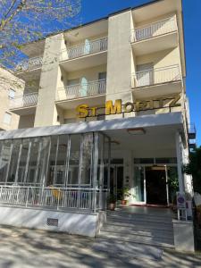 a building with a sign that reads st moritz at Hotel St. Moritz in Rimini