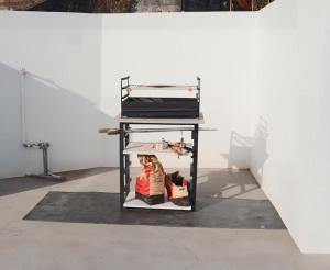 a table with a doll on it in a room at Fifty`s House 1 By Sam Houses in Ribeira Brava