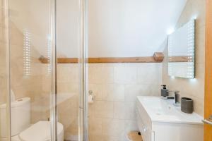 a bathroom with a shower and a toilet and a sink at 3 Bed in Ebberston oc-s35053 in Ebberston +47 photos