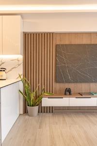 a kitchen with a sink and a counter at Riviera Zen apartment in Mesochórion +31 photos