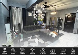 a living room with a couch and a chandelier at Vault 607 Homestay in Davao City