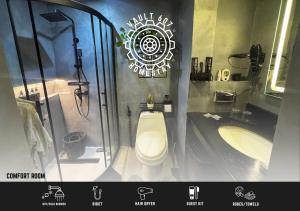 a bathroom with a toilet and a sink and a tub at Vault 607 Homestay in Davao City