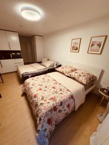 a bedroom with two beds in a room at Little Dream Konstanz in Konstanz