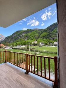a balcony with a view of a mountain at Guesthouse Natyra Theth in Theth +23 photos
